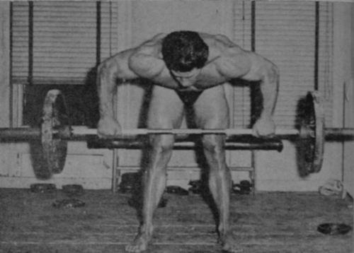Reg Park performing the Bent-Forward Row with a barbell.