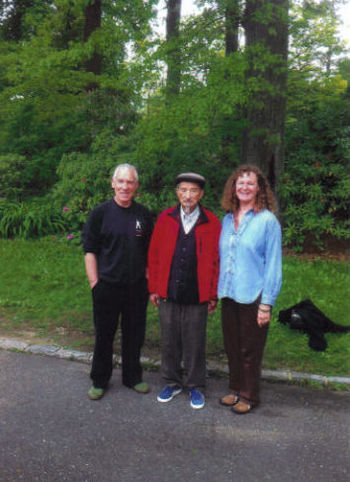 Peter Yates standing with Sifu Share K. Lew and his wife Juanita.